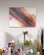 Flow above a round side table with flowers in a styled space