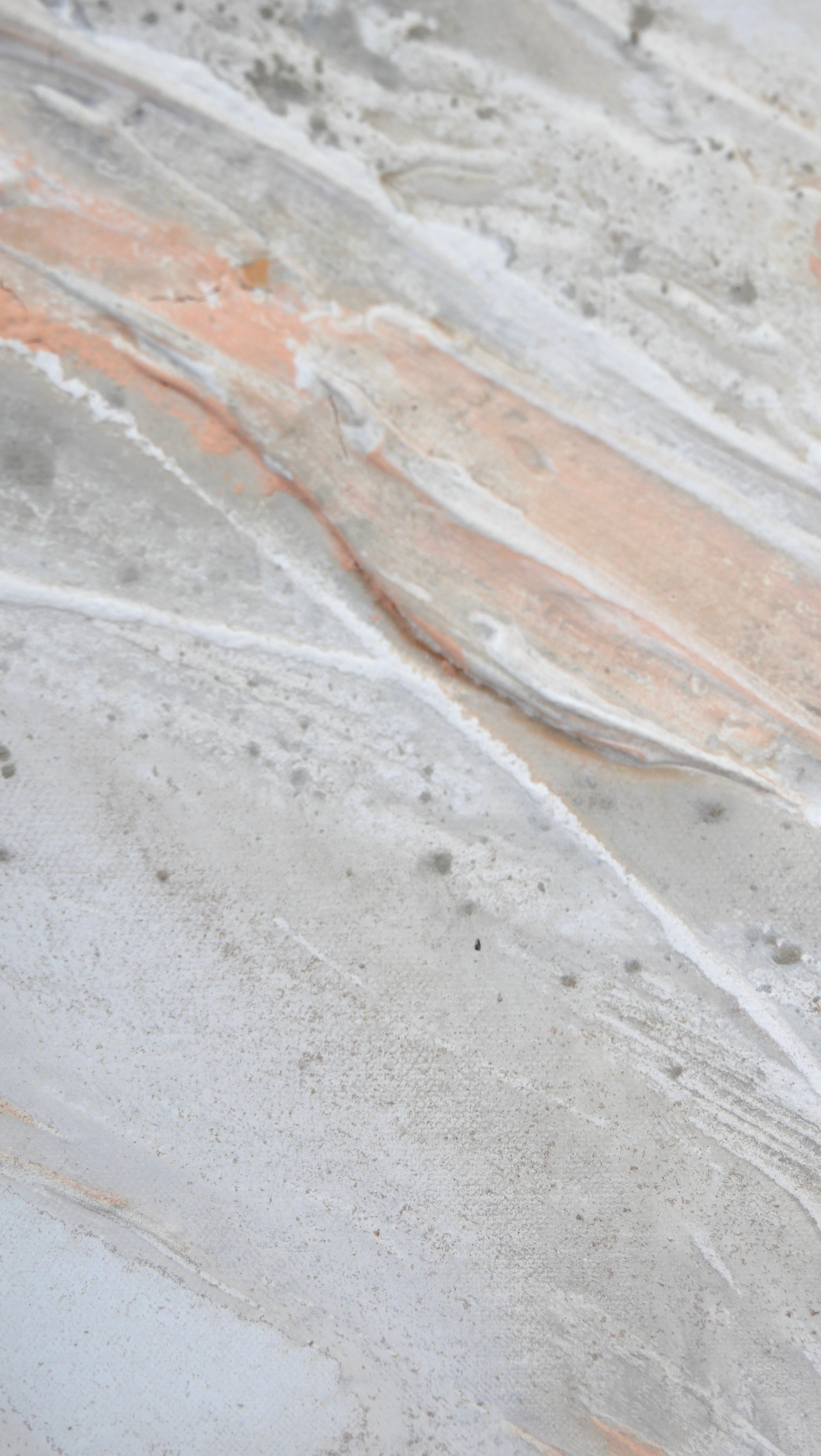 Close view of the flowing texture and warm sand tones in Peace