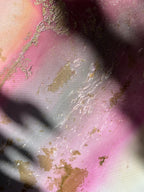 Detail of pink and gold with a soft shadow across Flow