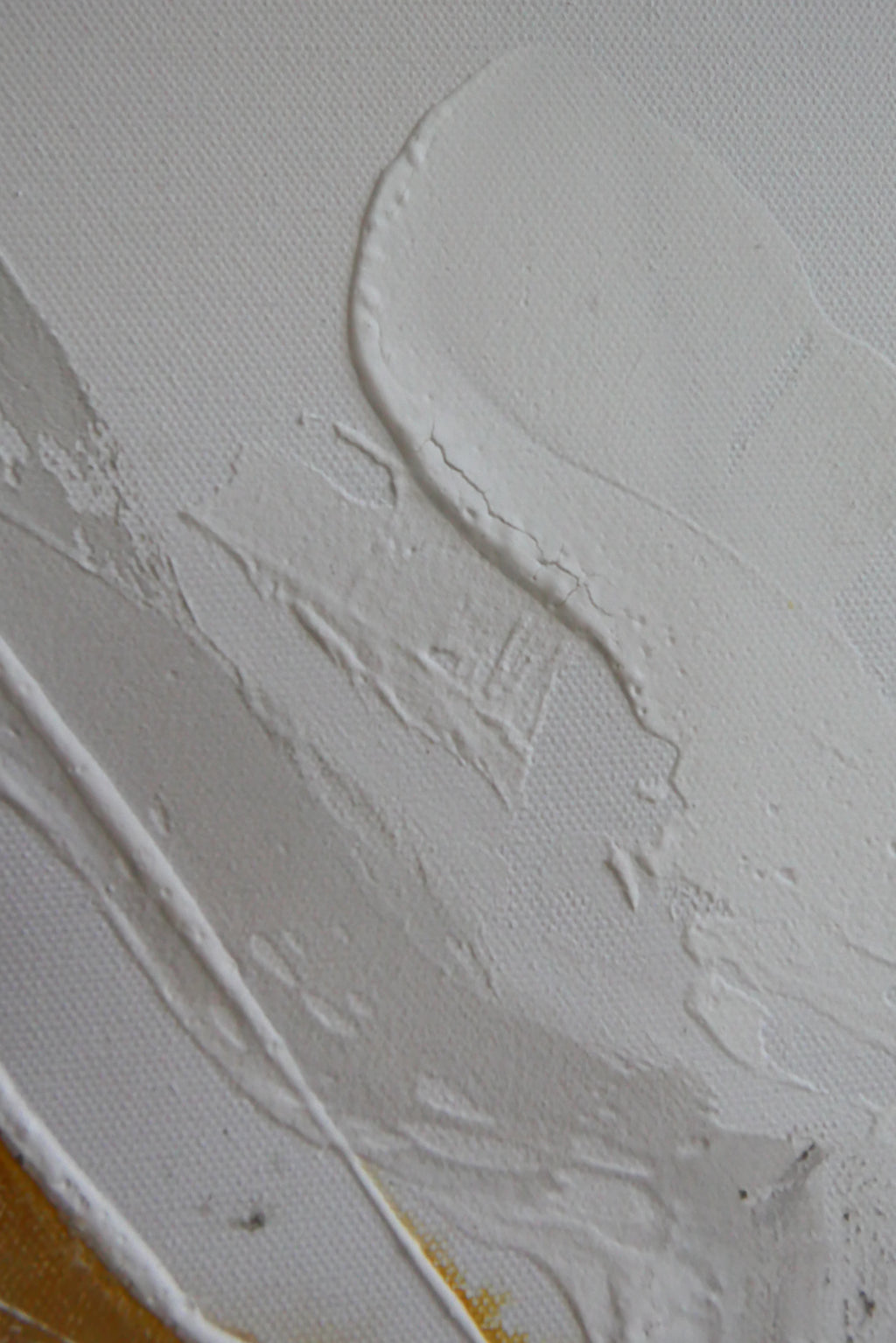 Close-up of the white textured field of Serenity 2, structure paste catching the light