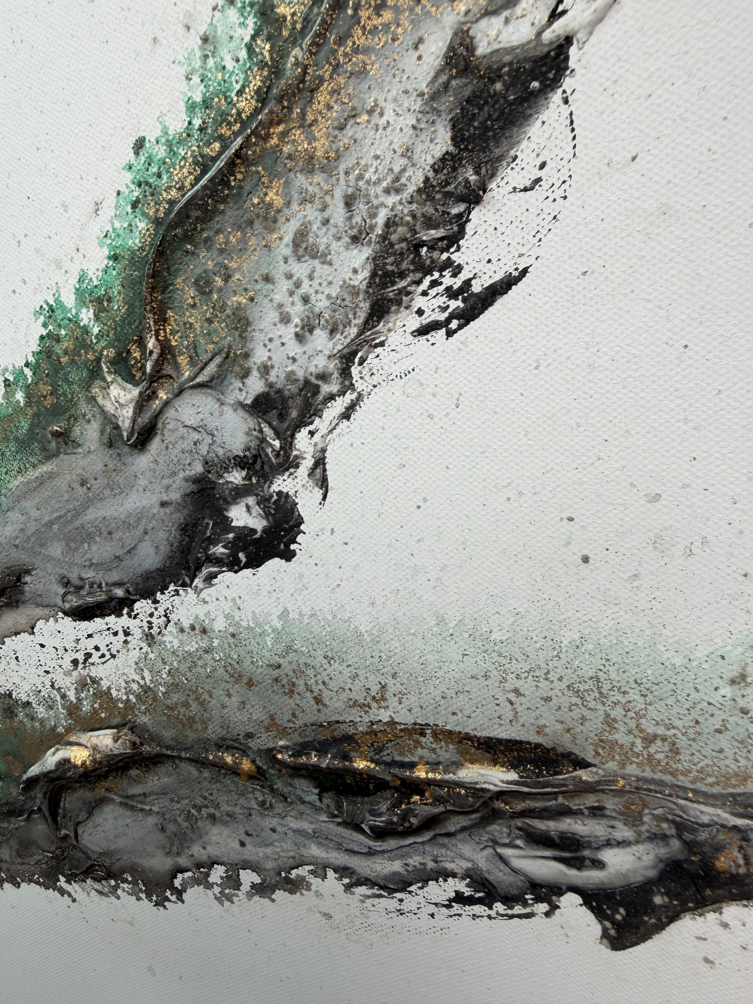 Close-up of black and gold splatters over the white ground of Rooted 2