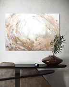 Peace hanging above a dark console table in a calm modern living room