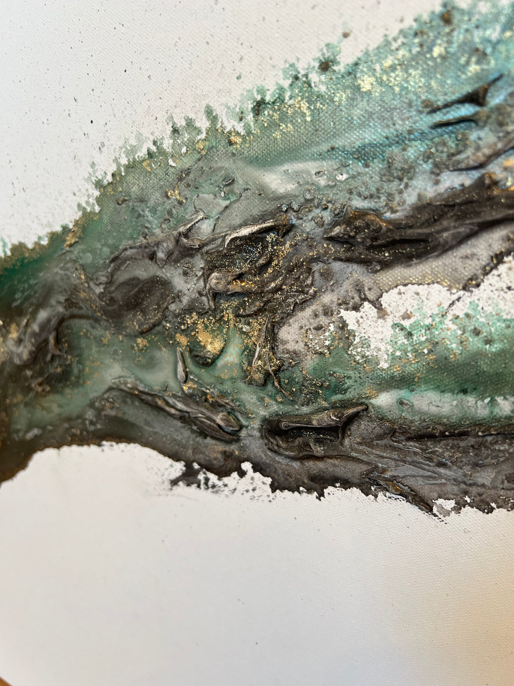 Macro of green, gold and black running through the white ground of Rooted 2