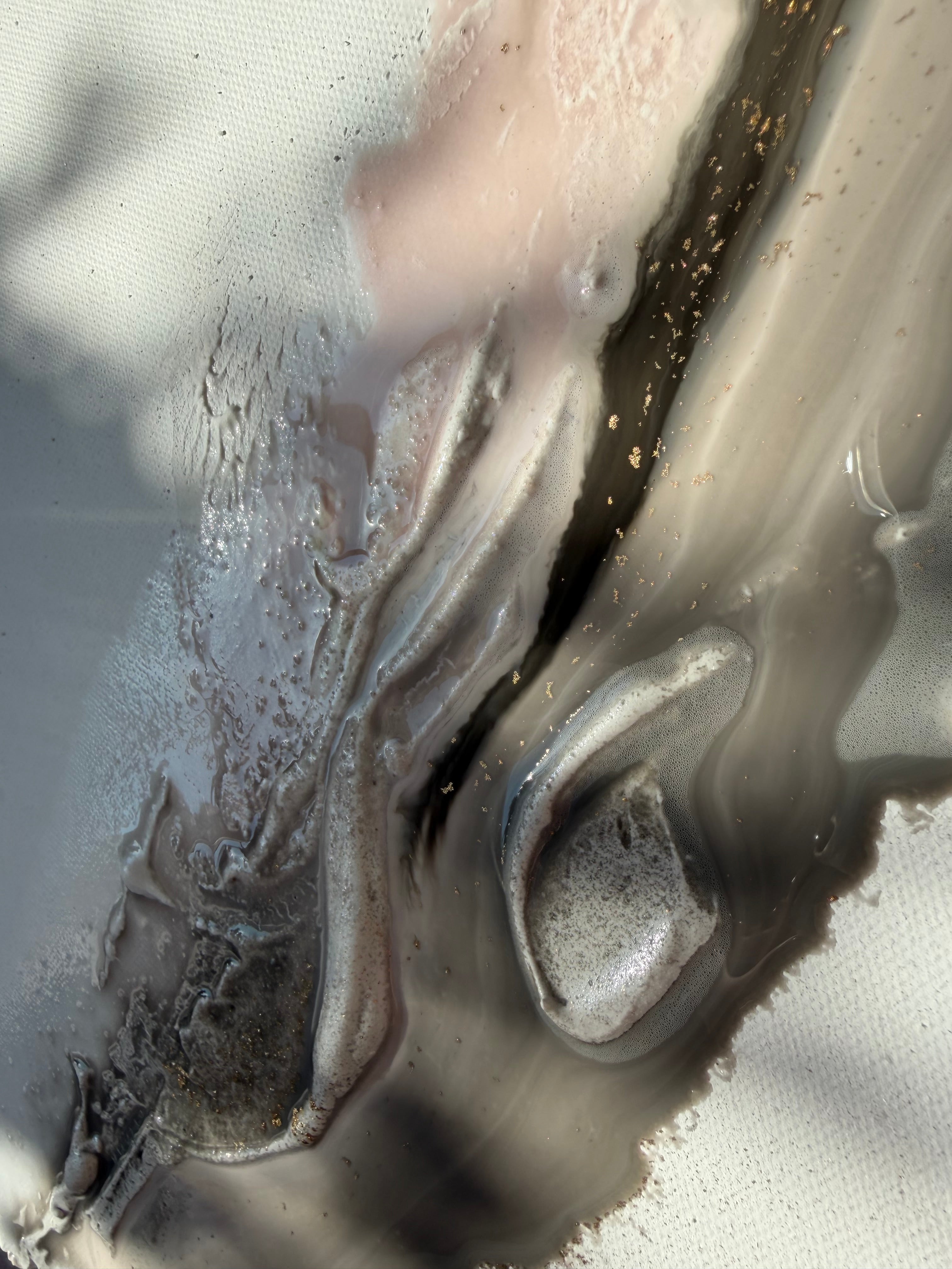 Surface detail of Bedrock, glossy grey and gold ridges where the structure paste catches the light.