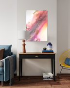Flow above a console with a lamp beside a blue armchair