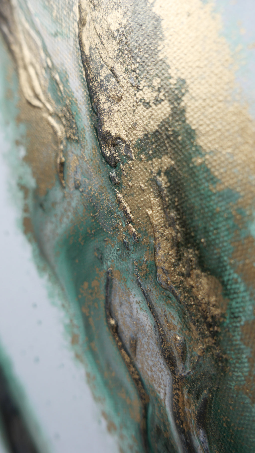 Macro of gold pigment caught in the canvas weave of Rooted 1