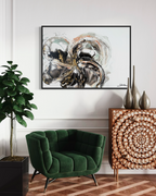 Unfold framed in black on a panelled wall above a green velvet sofa