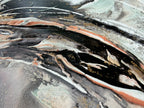 Detail of black, coral and green strokes layered across Unfold