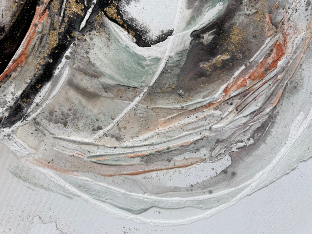 Close view of the pale grey and white sweep with coral running through Unfold