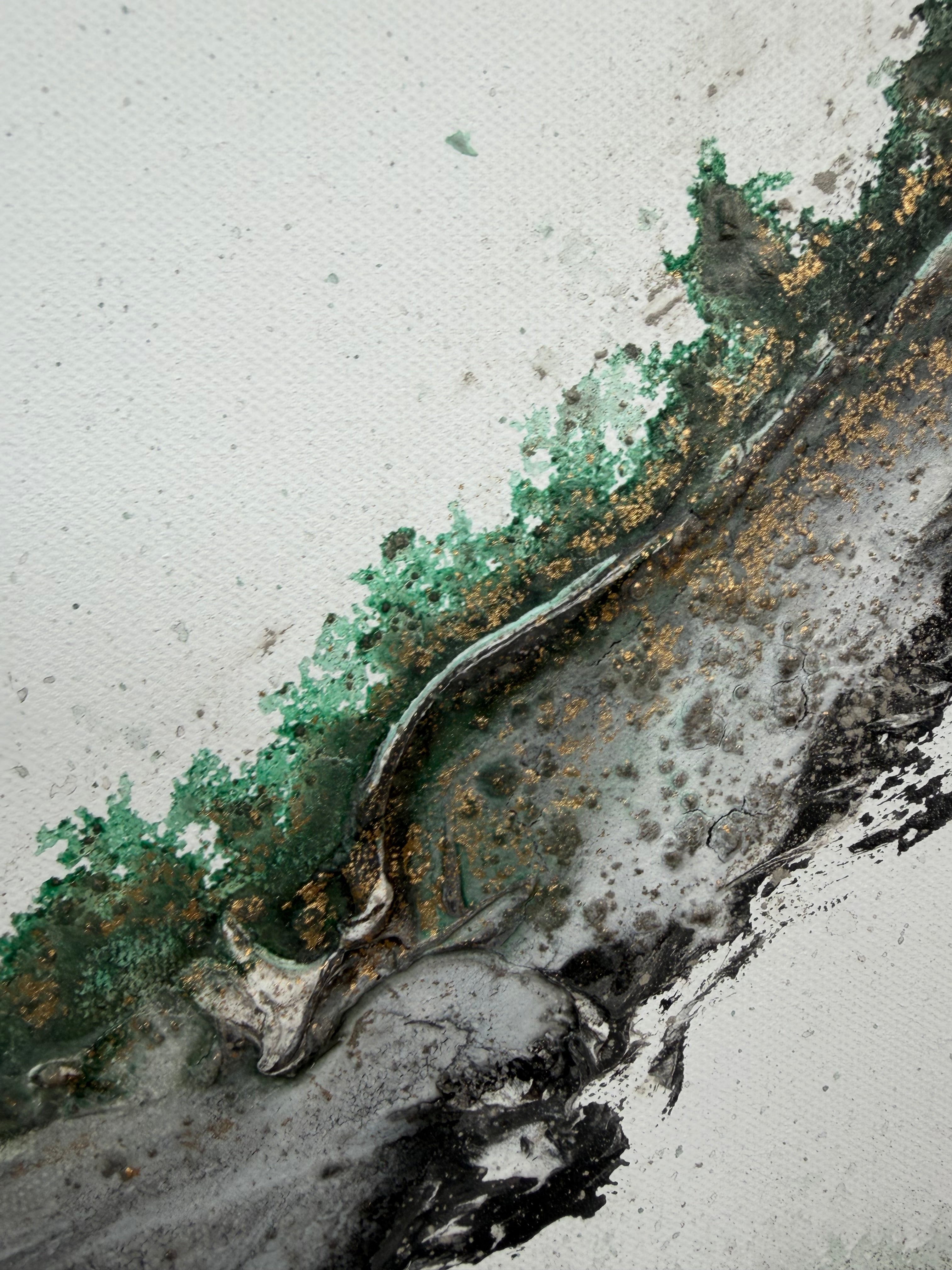 Detail of Rooted 2 with a raised black ridge and gold along the green edge