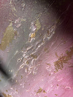 Macro of the raised texture and gold spray in Flow