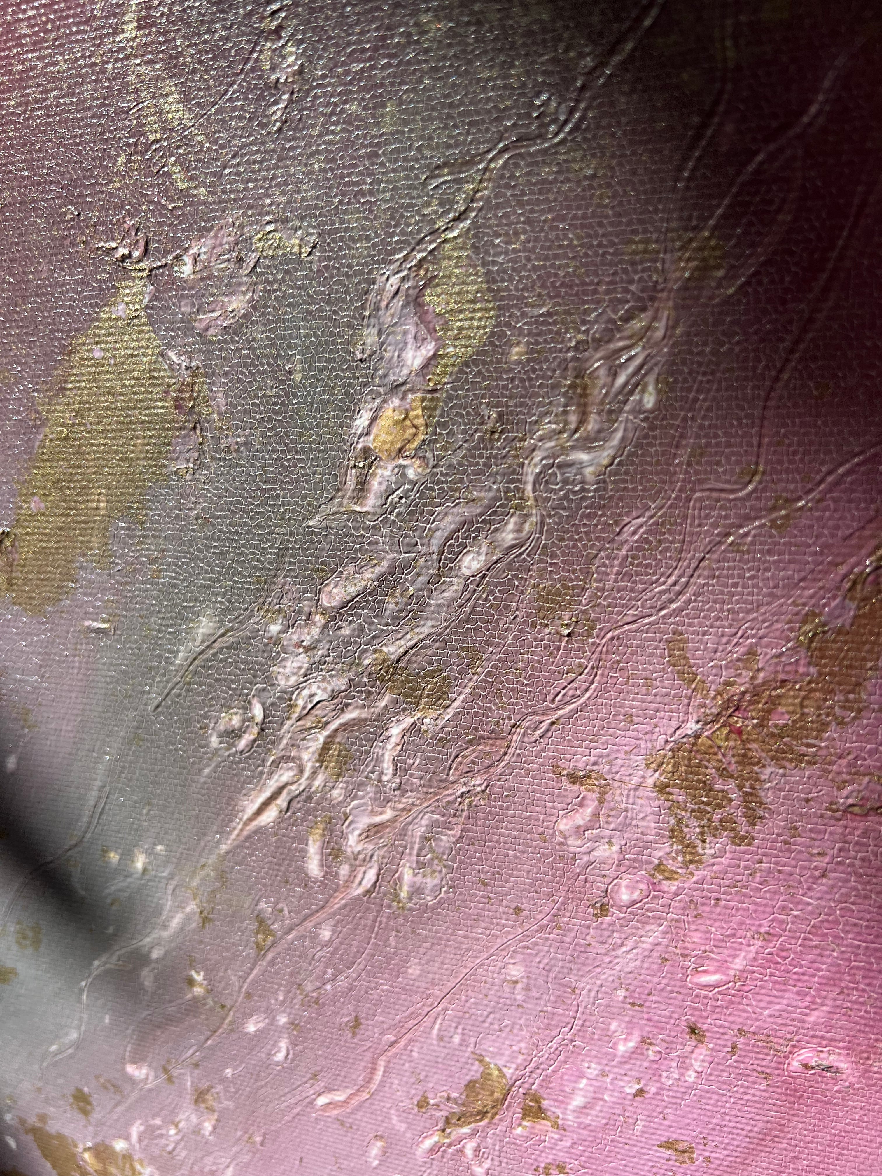 Macro of the raised texture and gold spray in Flow