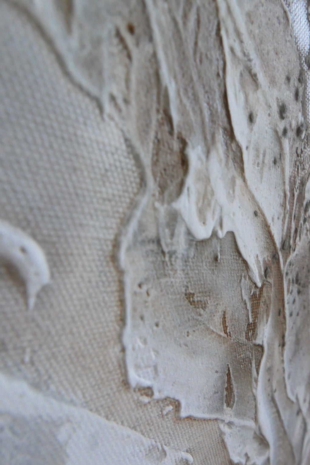 Texture detail of Liberation 1 where white structure paste meets the raw canvas weave.