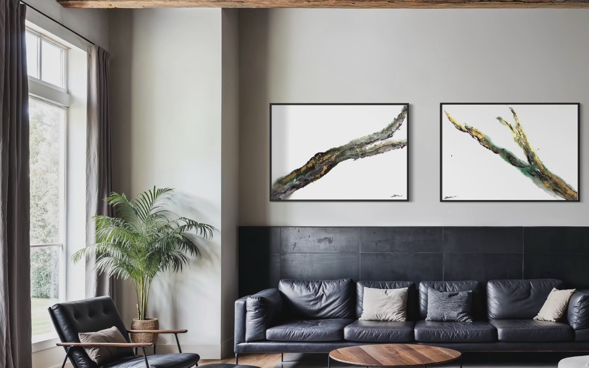 Video of Rooted 1 and Rooted 2 hanging together above a dark leather sofa