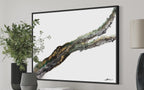 Video of Rooted 2 framed in black, with dried flowers in the foreground