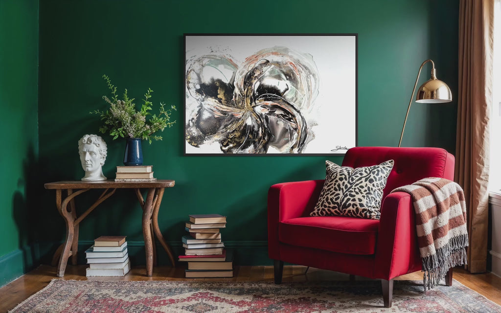 Video of Unfold on a deep green wall beside a red armchair