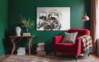 Video of Unfold on a deep green wall beside a red armchair
